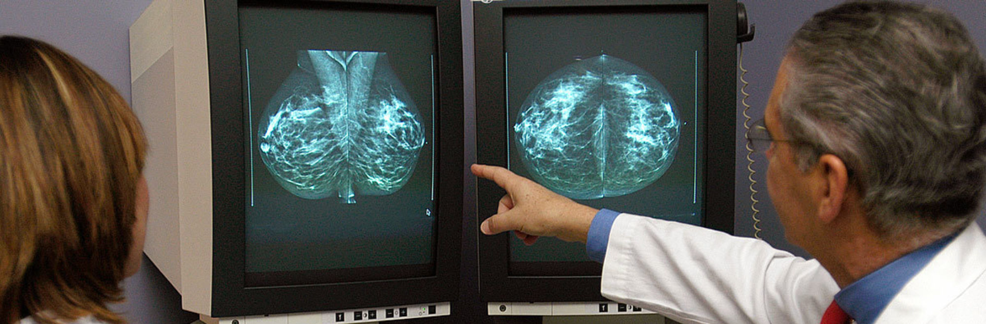 Patient and Doctor Reading Scans