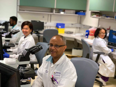 Clinical lab scientists smiling