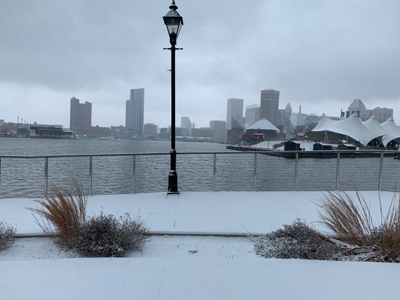 Harbor East Baltimore snowing - photography by Seena Tabibi